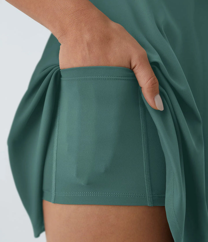 Flex Tango — Sukienka Aktywna z Krzyżowanymi Plecami | Szmaragdowy